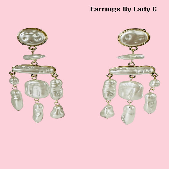 Pearl Dream elegant pearl drop earrings with a soft, timeless shimmer