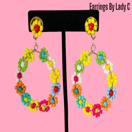 Tropic Spark colorful statement earrings with vibrant tropical hues