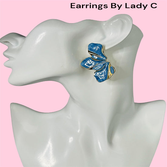 Sapphire Bloom Earrings with delicate blue flower design