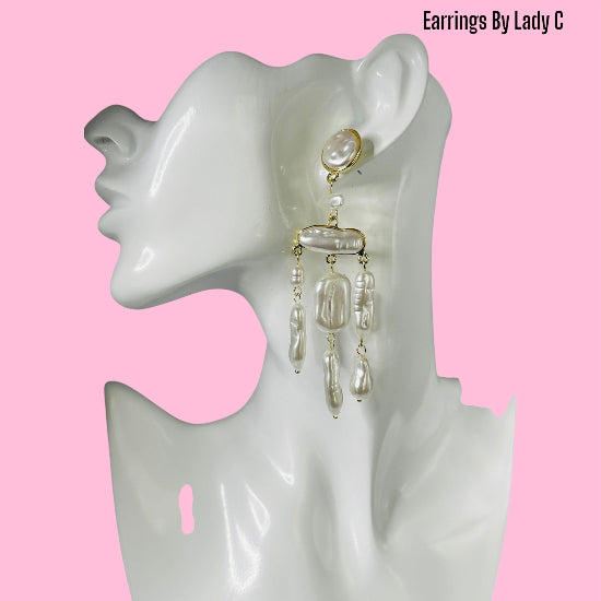 Pearl Dream elegant pearl drop earrings with a soft, timeless shimmer