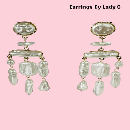 Pearl Dream elegant pearl drop earrings with a soft, timeless shimmer