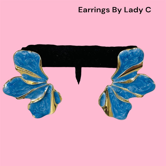 Sapphire Bloom Earrings with delicate blue flower design